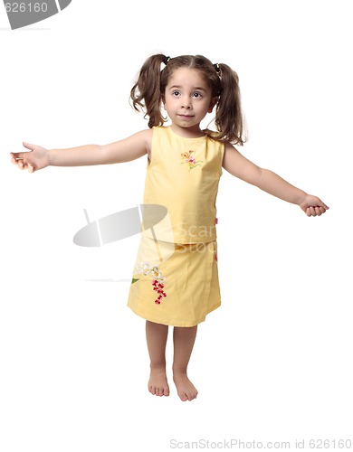Image of Little girl with arms outstretched