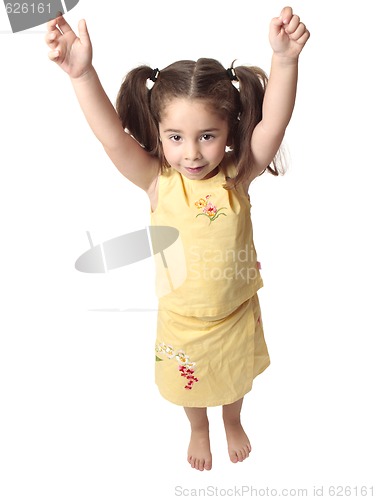 Image of Preschool girl with arms raised above head