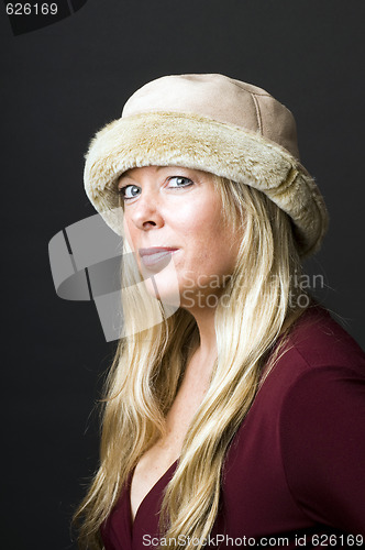 Image of sexy blond woman with fashion hat