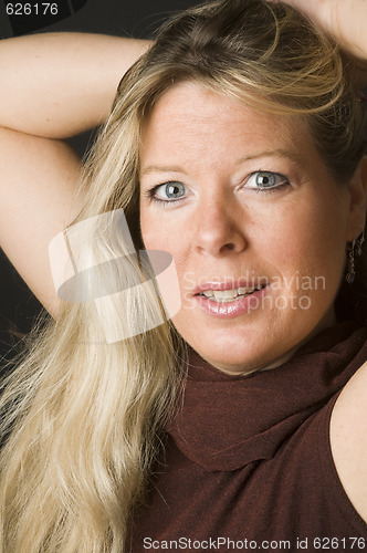 Image of sexy blond woman corporate head shot with smile