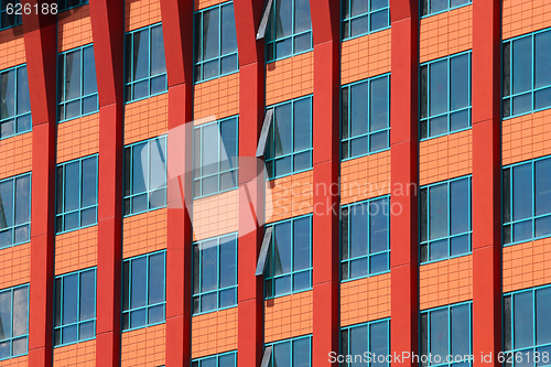 Image of modern  building with many glass windows