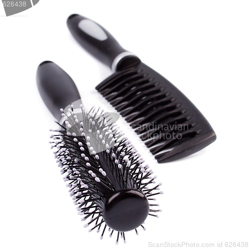 Image of two hairbrushes