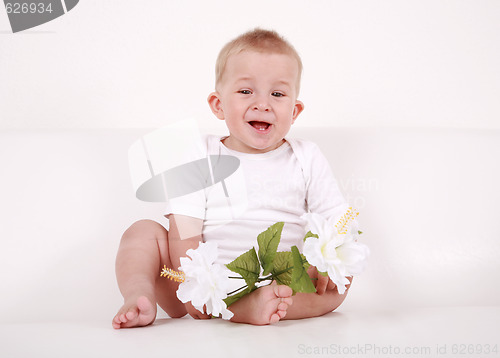Image of Baby with flowers