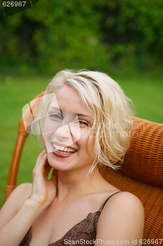 Image of Beautiful Smiling Woman in the garden