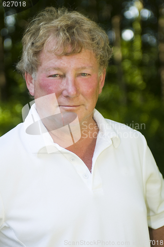 Image of  happy  middle age senior tennis player male