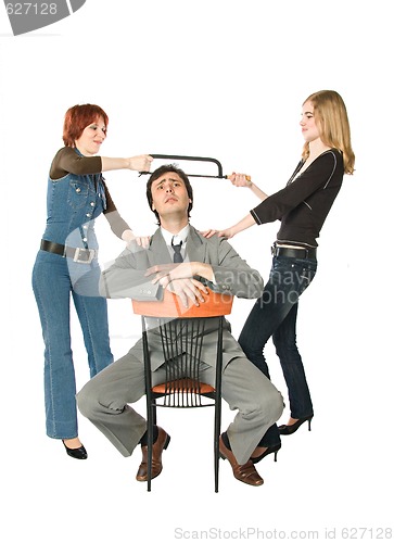 Image of Two women dividing a man