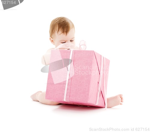 Image of baby boy with big gift box