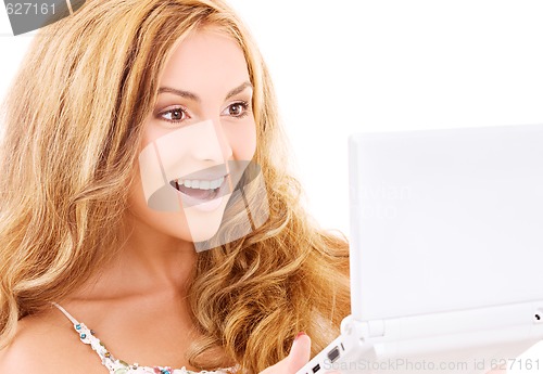 Image of happy woman with laptop computer