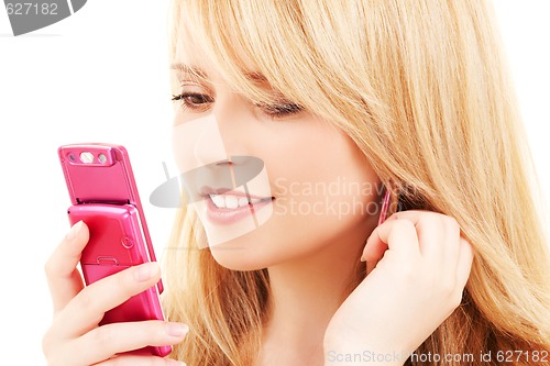 Image of happy teenage girl with cell phone