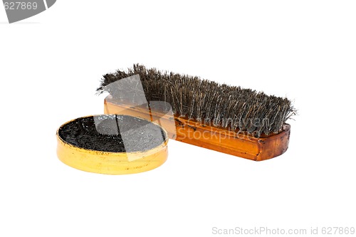 Image of Shoe wax and a brush