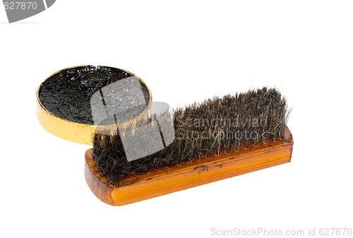 Image of Shoe wax and a brush 