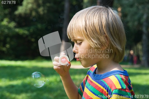 Image of Boy with soap bubbles