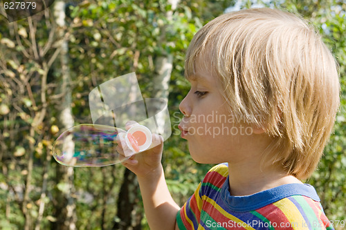 Image of Boy with soap bubbles