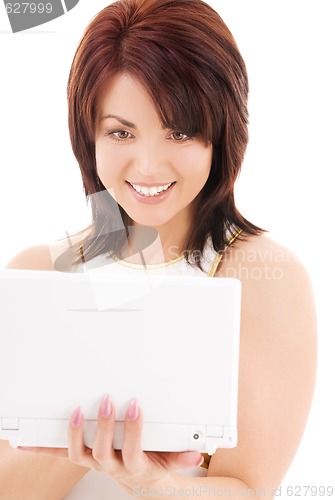Image of happy woman with laptop computer