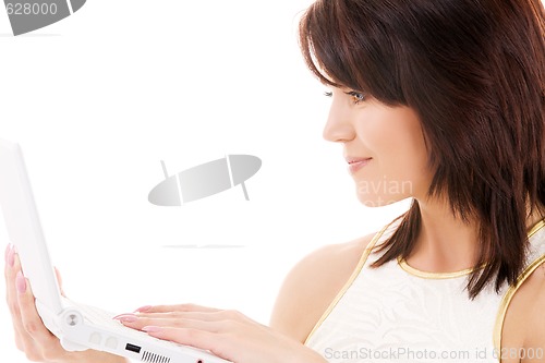Image of happy woman with laptop computer