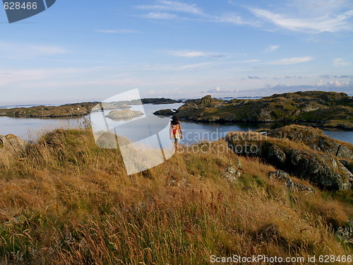 Image of coastal landscape and girl