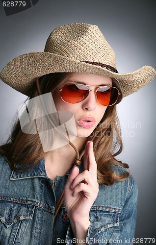 Image of cowgirl with imaginative gun