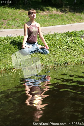 Image of meditation near by water