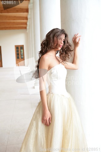 Image of beautiful girl near pillars