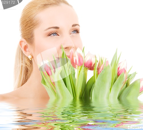 Image of happy woman with flowers