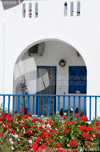 Image of greek cyclades island architecture with flowers