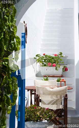 Image of greek cyclades island architecture with flowers