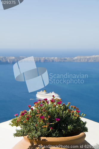 Image of view of volcanic islands of santorini greece and cruise ship in 