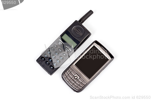 Image of Old and new mobile phones. Isolated on white