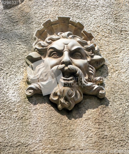 Image of Face on a Wall