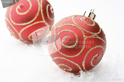 Image of Red Christmas bauble decorations.