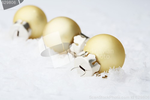 Image of Gold Christmas bauble decorations.