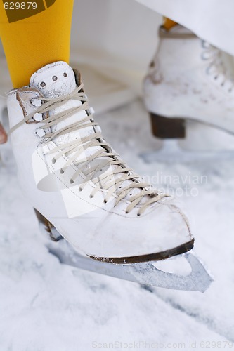 Image of Close-up of an ice skate on a female foot.