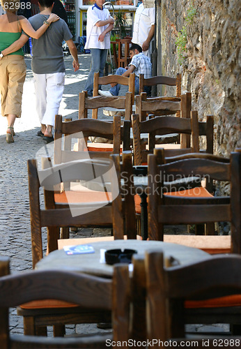 Image of Couple walking in downtown bars street