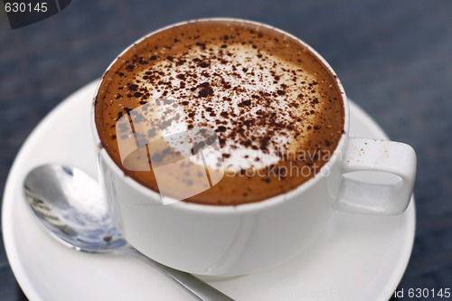 Image of Delicious cappuccino in a white cup.