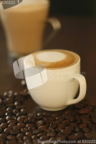 Image of Delicious piccolo latte in small cup.