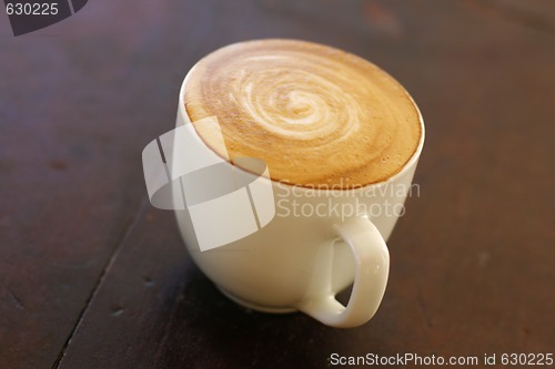 Image of Delicious piccolo latte in small cup.