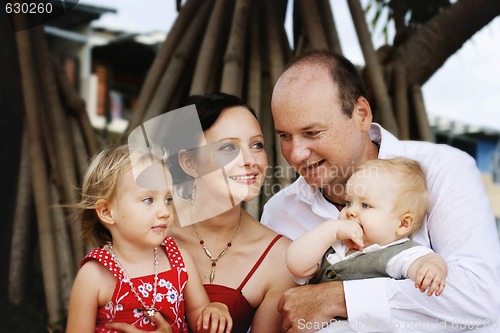 Image of Family enjoying themselves in an outdoor nature setting.