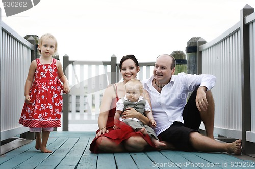 Image of Family enjoying themselves in an outdoor nature setting.