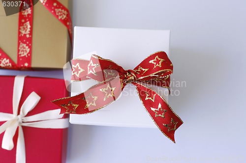 Image of Christmas gifts on a light surface.