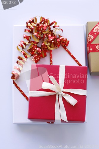 Image of Christmas gifts on a light surface.