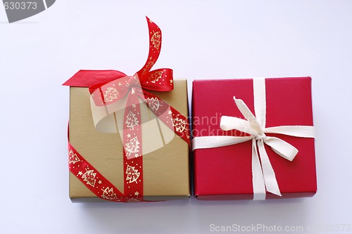 Image of Christmas gifts on a light surface.