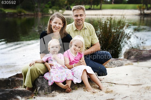 Image of Family enjoying themselves in an outdoor nature setting.