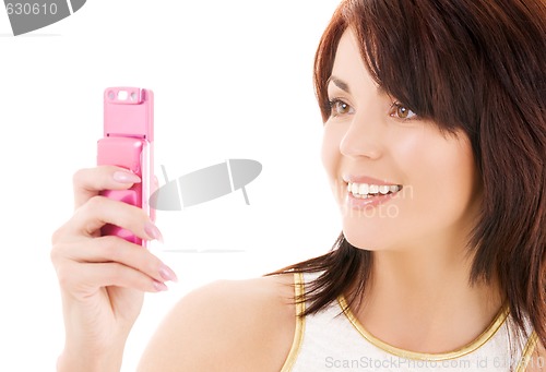 Image of happy woman with cell phone