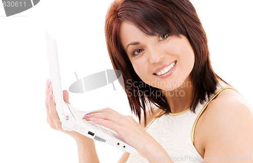 Image of happy woman with laptop computer
