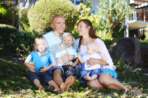 Image of Family enjoying themselves in an outdoor nature setting.