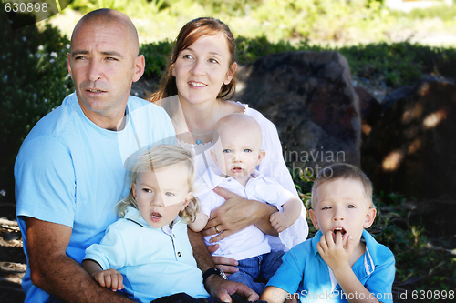 Image of Family enjoying themselves in an outdoor nature setting.