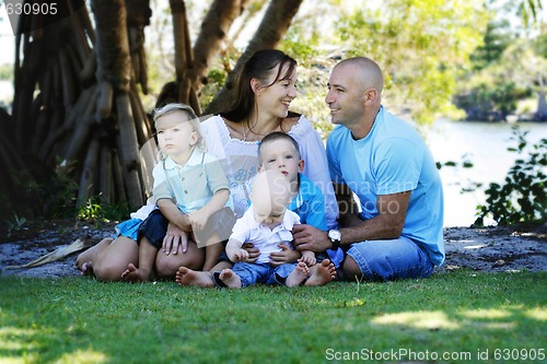 Image of Family enjoying themselves in an outdoor nature setting.