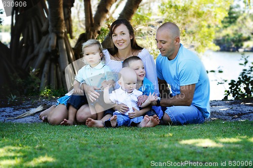 Image of Family enjoying themselves in an outdoor nature setting.