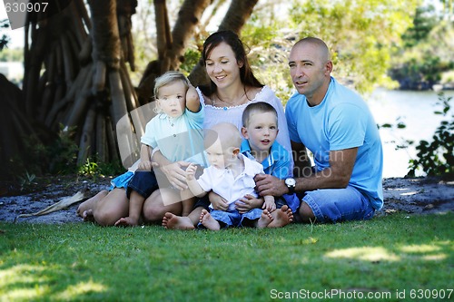 Image of Family enjoying themselves in an outdoor nature setting.