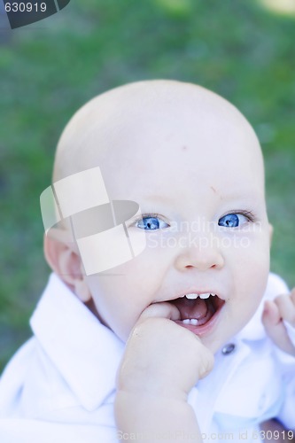 Image of Close-up portrait of a happy little boy.